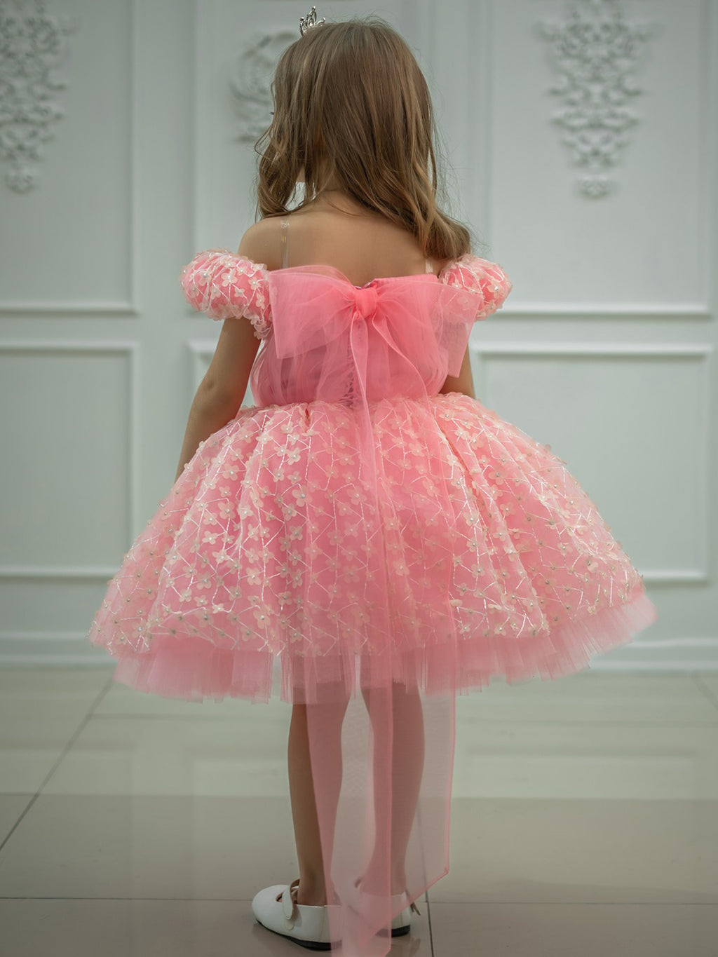 Pink tulle girls princess dress back view with big tulle bow and long ribbon tails, designed for birthday photos.