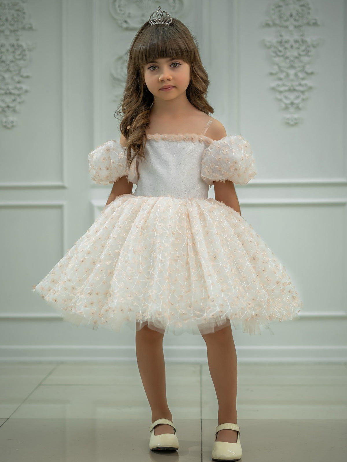 Ivory tulle girls princess dress with 3D flower appliqués, pearl centers and off-shoulder puff sleeves, designed for flower girls and weddings.