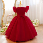 Wine red girls formal dress showing the flutter sleeves and rose neckline, side view 2.