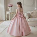 Pink long tulle flower girl dress with bow details