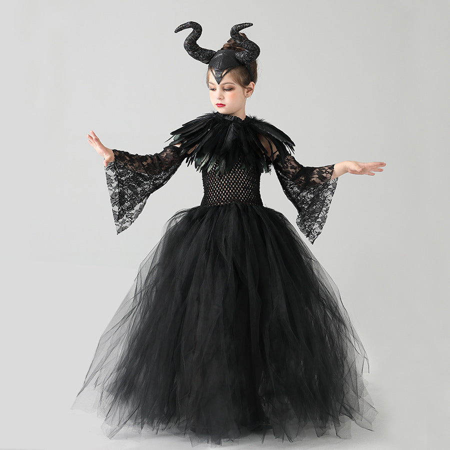 Black tulle girls Halloween gown with horned headpiece and lace sleeves, designed for stage shows.