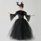 Black tulle girls Halloween gown with horned headpiece and lace sleeves, designed for stage shows.