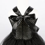 Black girls Halloween dress with satin halter bow and stretch mesh bodice, designed for costume parties.