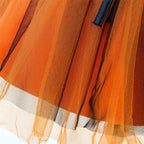 Black and orange girls dress with off-shoulder tulle ruffle, spiderweb lace corset bodice and tulle skirt, designed for Halloween parties, view 10