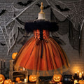 Black and orange girls dress with off-shoulder tulle ruffle, spiderweb lace corset bodice and tulle skirt, designed for Halloween parties.