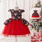 Black and red girls dress with reindeer print bodice, bow peplum and red tulle skirt, designed for Christmas parties, view 2