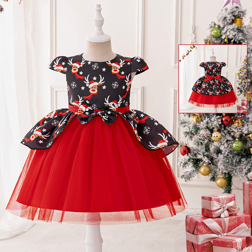 Black and red girls dress with reindeer print bodice, bow peplum and red tulle skirt, designed for Christmas parties, view 2