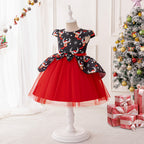 Black and red girls dress with reindeer print bodice, bow peplum and red tulle skirt, designed for Christmas parties, view 3