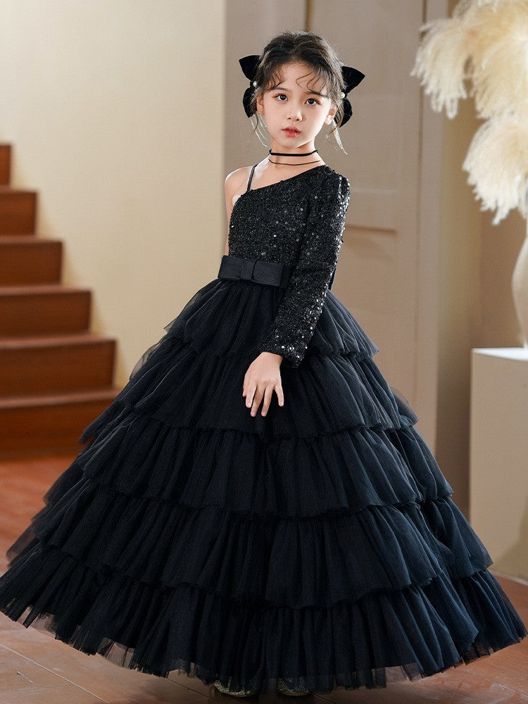 Black sequin girls party dress with a tiered ball skirt, side view 2.