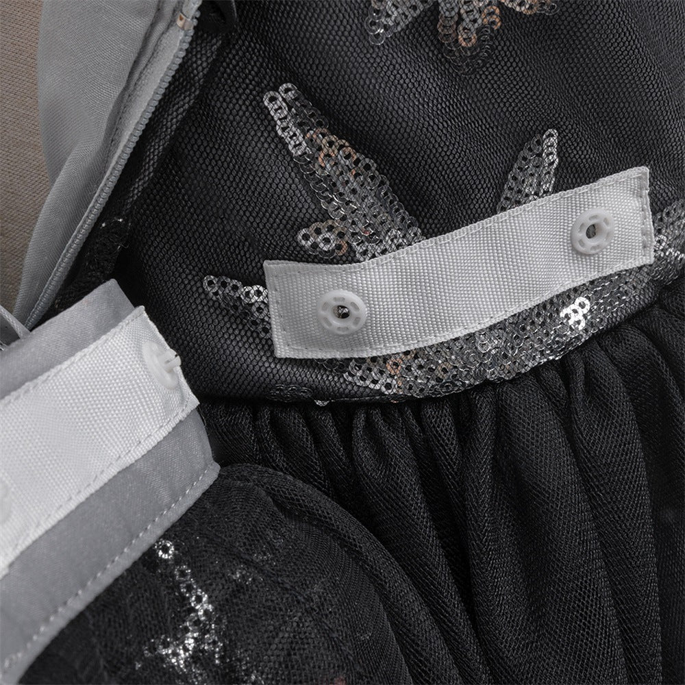 Inside view of the black girls gown showing the lined bodice and waist finishing.