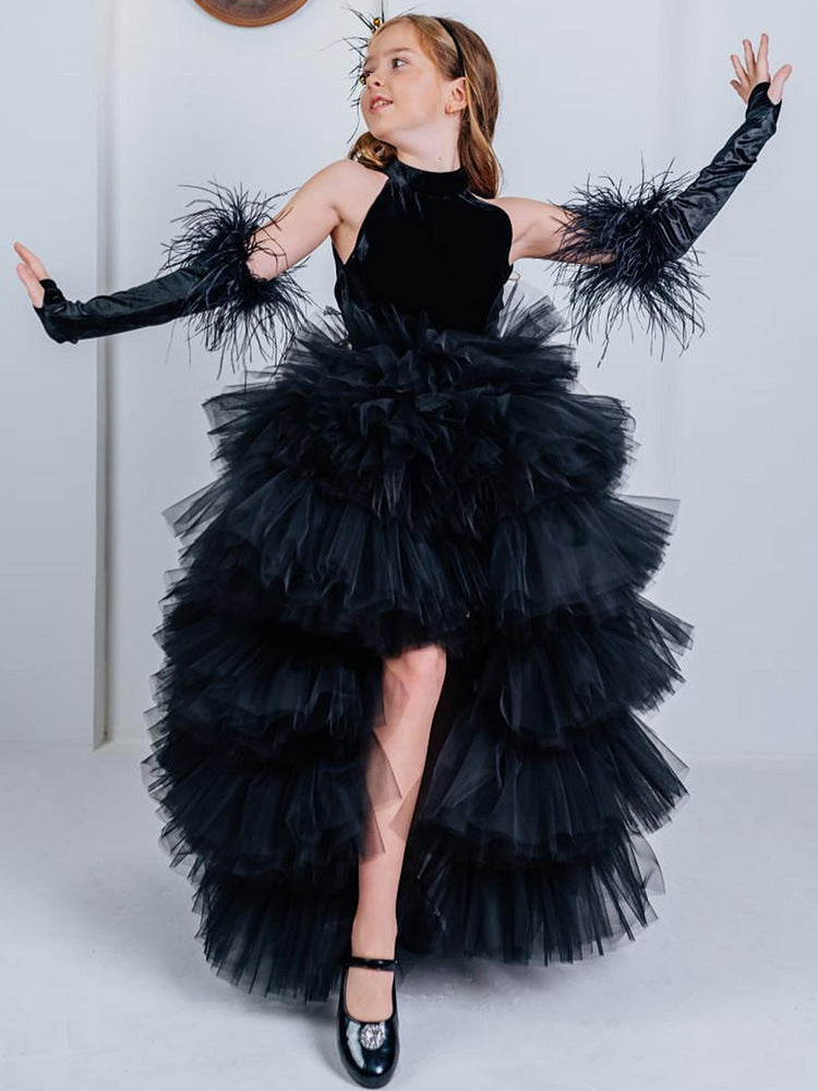 Black velvet girls tulle gown with halter neck, bow open back and tiered high-low ruffle skirt, designed for birthdays and pageants, view 4
