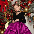 Black and magenta velvet and satin girls dress with long puff sleeves and beaded flowers, designed for Christmas parties.