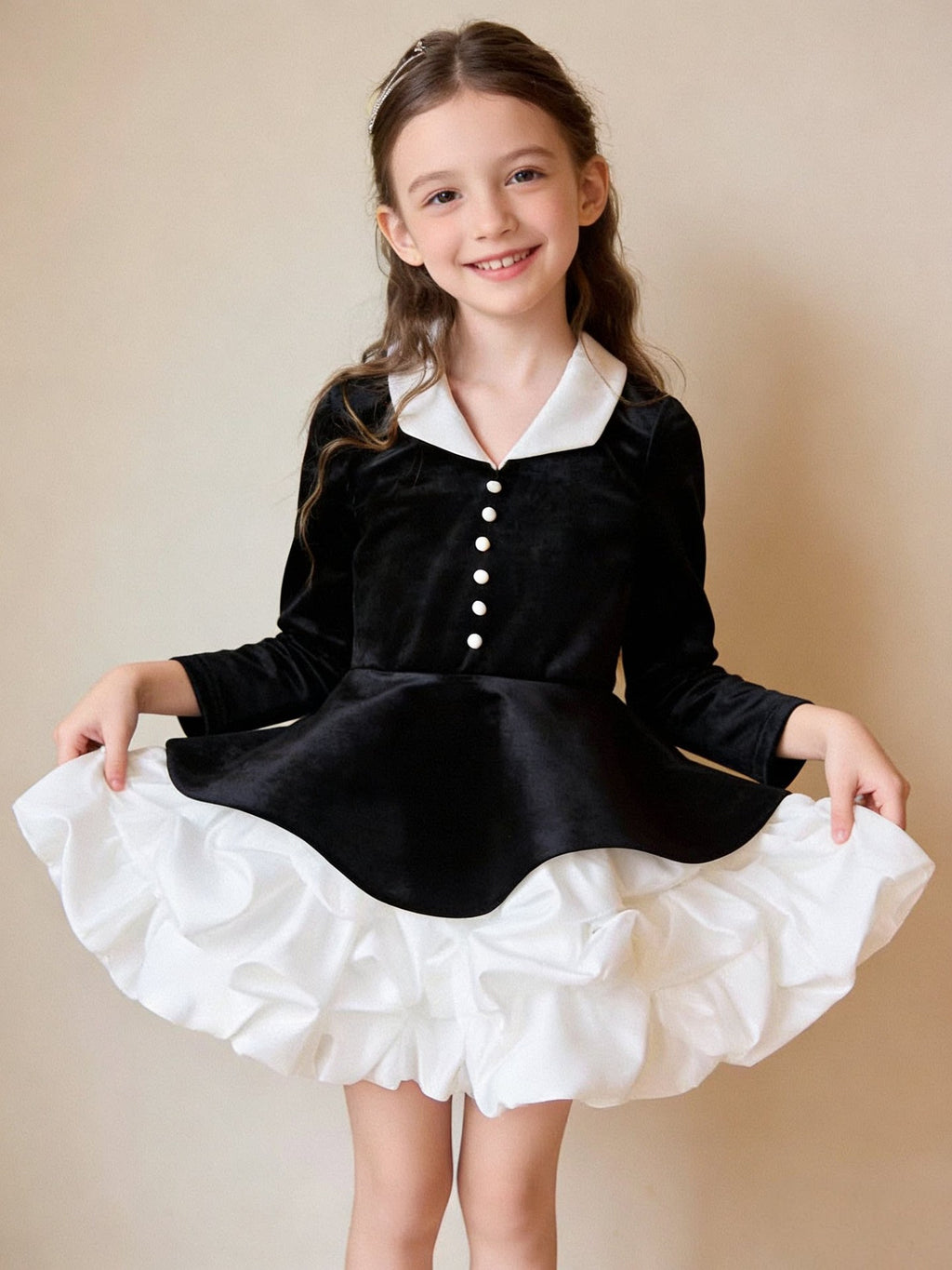Black and white velvet girls dress with long sleeves and white bubble skirt, designed for piano recitals.