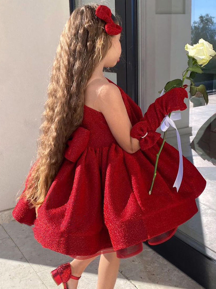 Burgundy glitter girls party dress with one-shoulder bow neckline and puffy knee-length skirt, designed for birthdays and Christmas parties, view 3