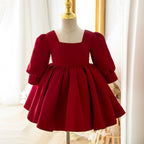 Burgundy satin girls party dress with a square neckline and long puff sleeves, front view, for birthday girls dresses.