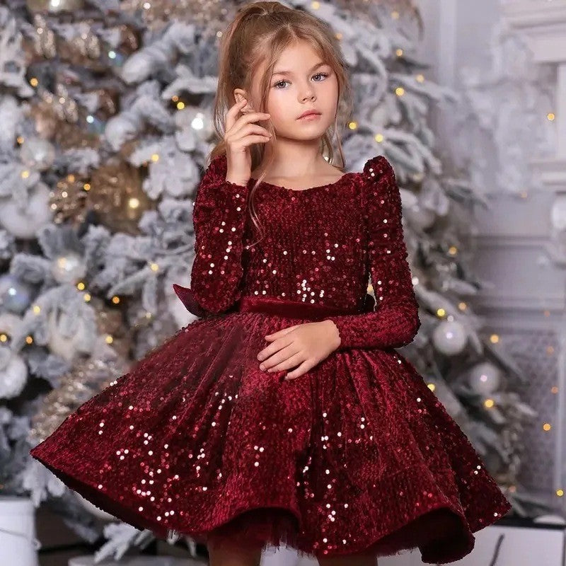 Burgundy sequin girls Christmas dress with long sleeves and a full skirt, front view, for a holiday party.