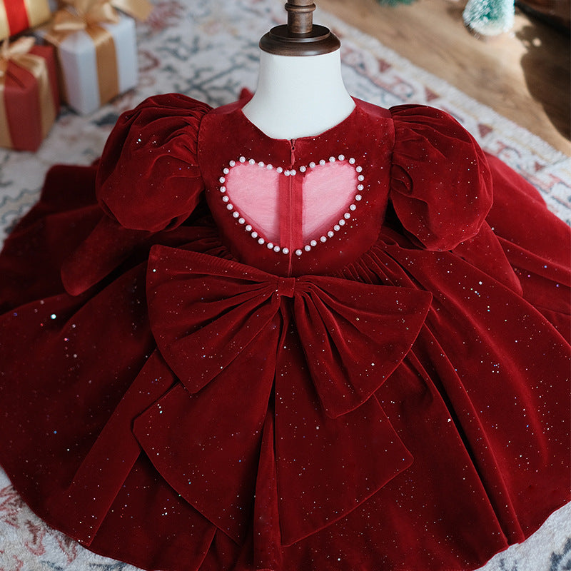 Burgundy velvet girls party dress with long puff sleeves, sheer yoke and pearl heart back bow, designed for Christmas and holiday parties, view 11