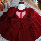 Burgundy velvet girls party dress with long puff sleeves, sheer yoke and pearl heart back bow, designed for Christmas and holiday parties, view 11