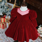 Burgundy velvet girls party dress with long puff sleeves, sheer yoke and pearl heart back bow, designed for Christmas and holiday parties, view 9
