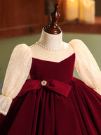 Burgundy velvet girls dress with champagne lace puff sleeves, pearl-center bow and full knee-length skirt, designed for Christmas and holiday parties, view 10