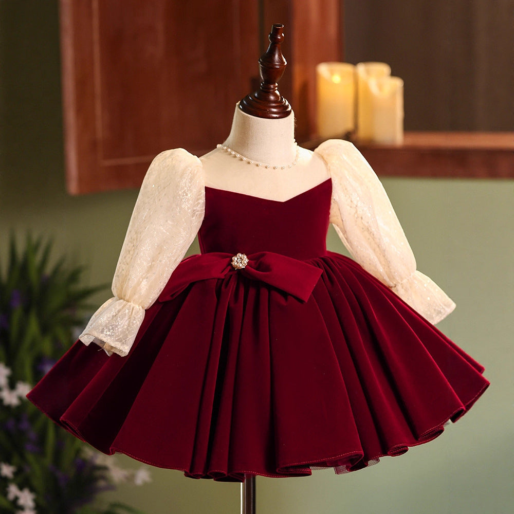 Burgundy velvet girls dress with champagne lace puff sleeves, pearl-center bow and full knee-length skirt, designed for Christmas and holiday parties, view 3