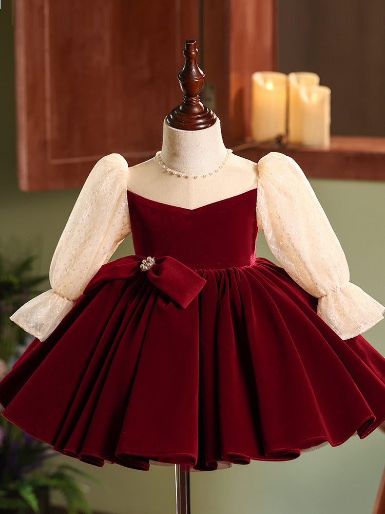 Burgundy velvet girls dress with champagne lace puff sleeves, pearl-center bow and full knee-length skirt, designed for Christmas and holiday parties, view 6