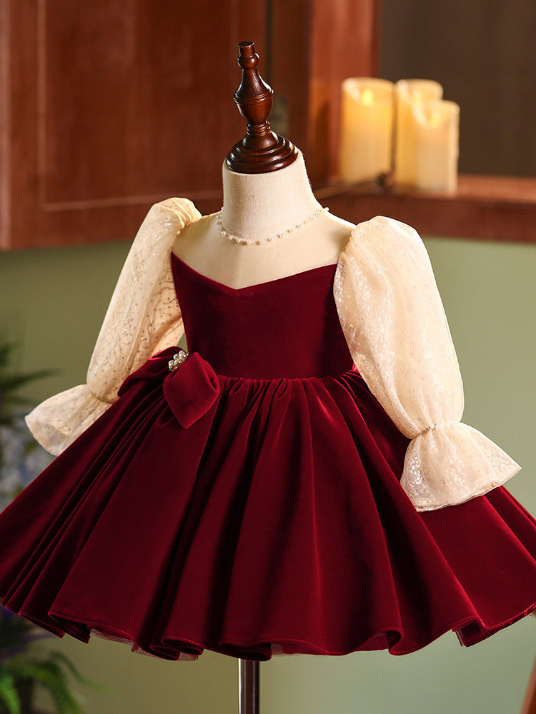 Burgundy velvet girls dress with champagne lace puff sleeves, pearl-center bow and full knee-length skirt, designed for Christmas and holiday parties, view 8