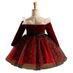 Burgundy velvet girls dress back view with long sleeves and a full sparkle tulle skirt, designed for Christmas events.