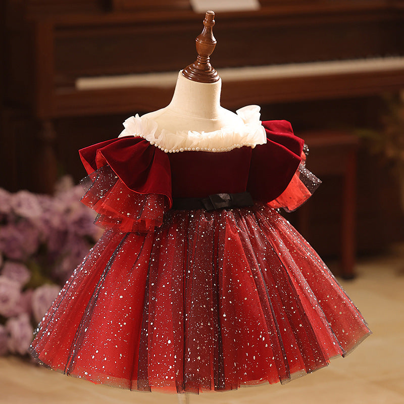 Burgundy velvet girls dress with pearl-trimmed ruffle collar, ruffle sleeves, black bow sash and sparkle tulle skirt, designed for Christmas and holiday parties, view 2