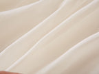 Soft cream chiffon fabric of the girls party dress, designed for birthdays and fall family photos.