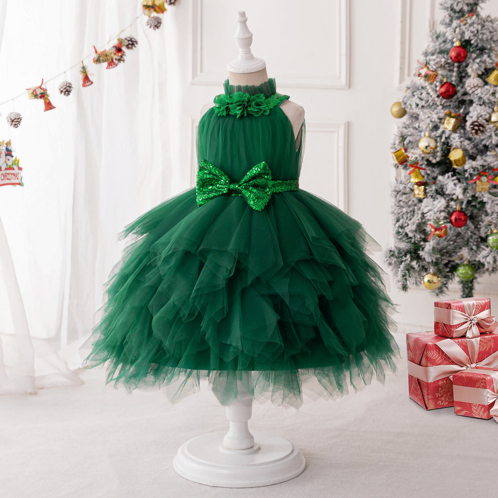 Dark green tulle girls dress with sequin bow at the waist and layered ruffle skirt, designed for holiday photos.