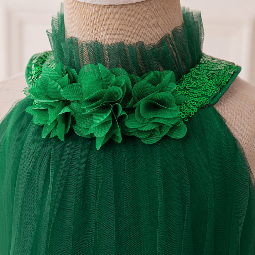 Dark green tulle girls dress with pleated high collar and fabric flowers at the neck, designed for holiday parties.