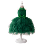 Dark green tulle girls dress with halter neck, sequin bow and tiered tutu skirt, designed for Christmas and birthday parties.