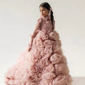 Dusty rose organza girls formal dress covered in rosettes, front view, for a stage performance.