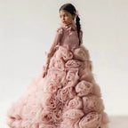 Dusty rose organza girls formal dress covered in rosettes, front view, for a stage performance.