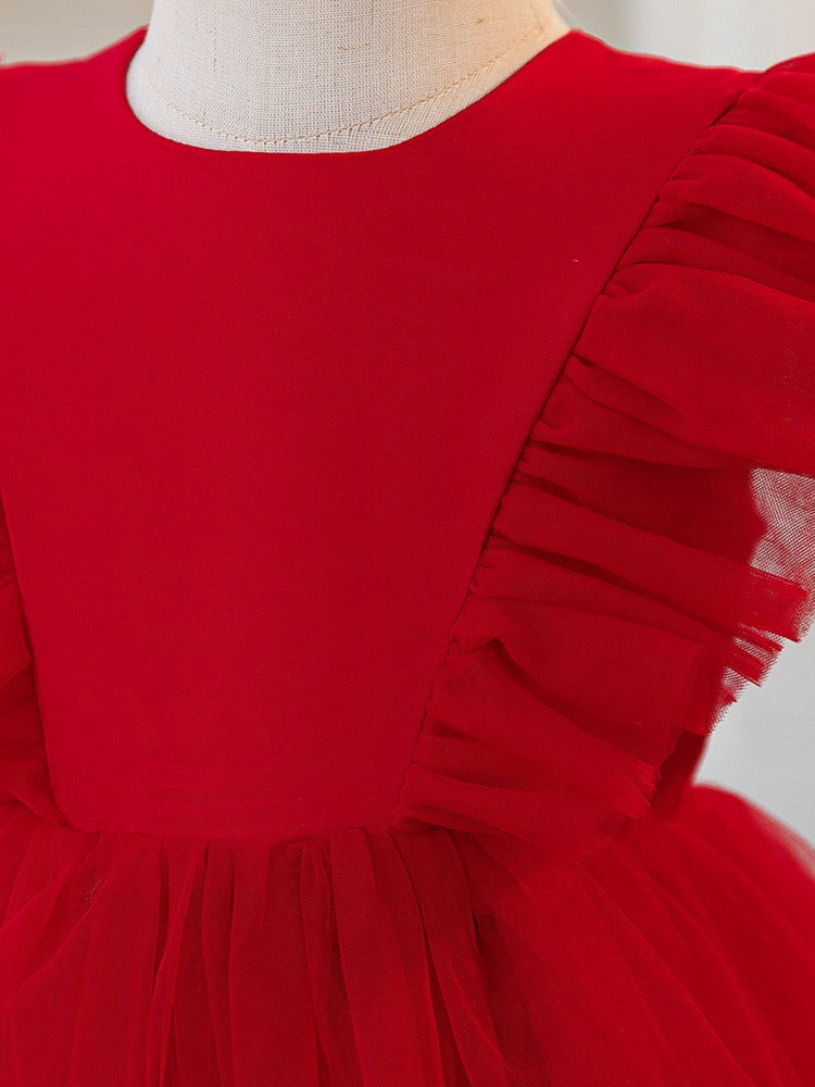 Close-up of the pleated flutter sleeve on the red princess dress for girls.