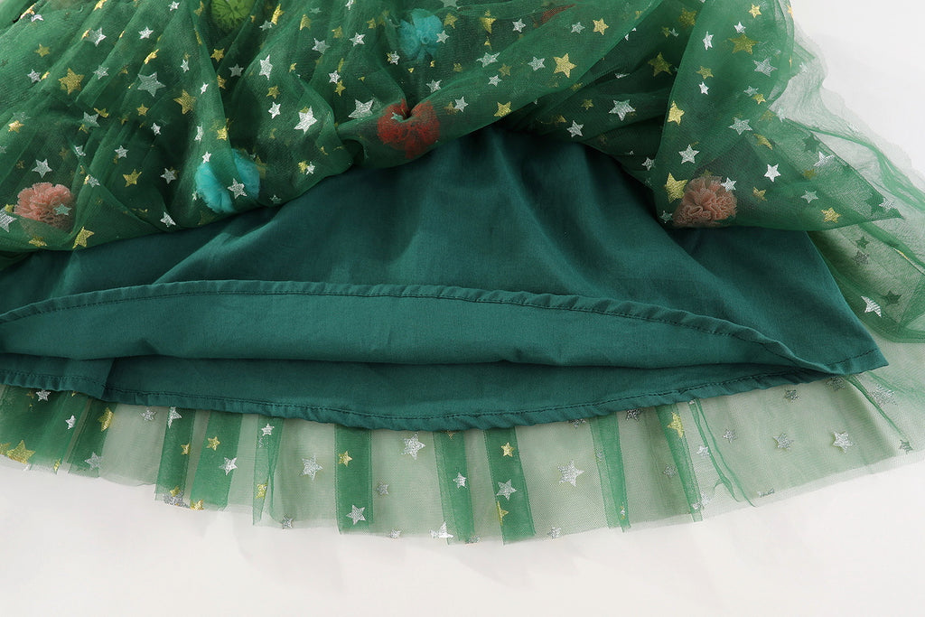 Green star tulle girls tiered tutu dress with pom-poms and holiday bows, designed for Christmas parties and holiday photos, view 12