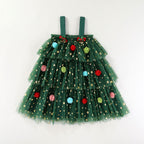 Green star tulle girls tiered tutu dress with pom-poms and holiday bows, designed for Christmas parties and holiday photos.