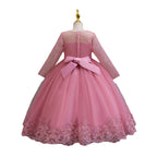 Mauve lace and tulle girls gown with a satin back bow and sheer lace back, designed for weddings and flower girls.