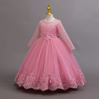 Mauve lace and tulle girls gown with long lace sleeves and a floral waist, designed for weddings and flower girls.