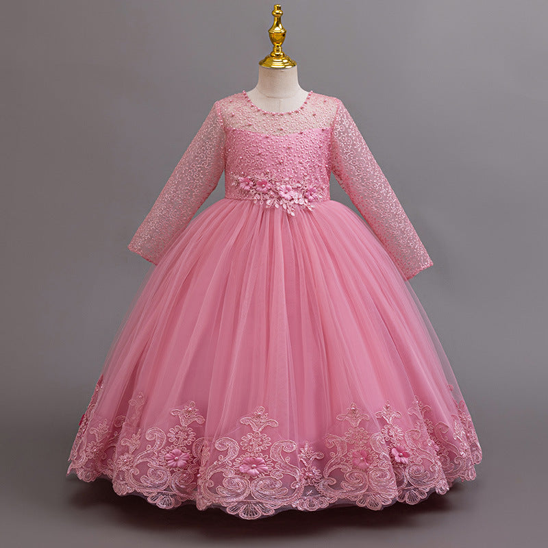 Mauve lace and tulle girls gown with long lace sleeves, a pearl-beaded bodice and a lace hem, designed for weddings and flower girls.