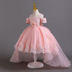 Pink lace girls gown side view with high-low organza train, designed for flower girls and photoshoots.