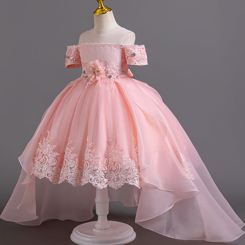 Pink lace girls gown with off-shoulder beaded sleeves, floral waist and high-low organza train, designed for flower girls and birthday parties.