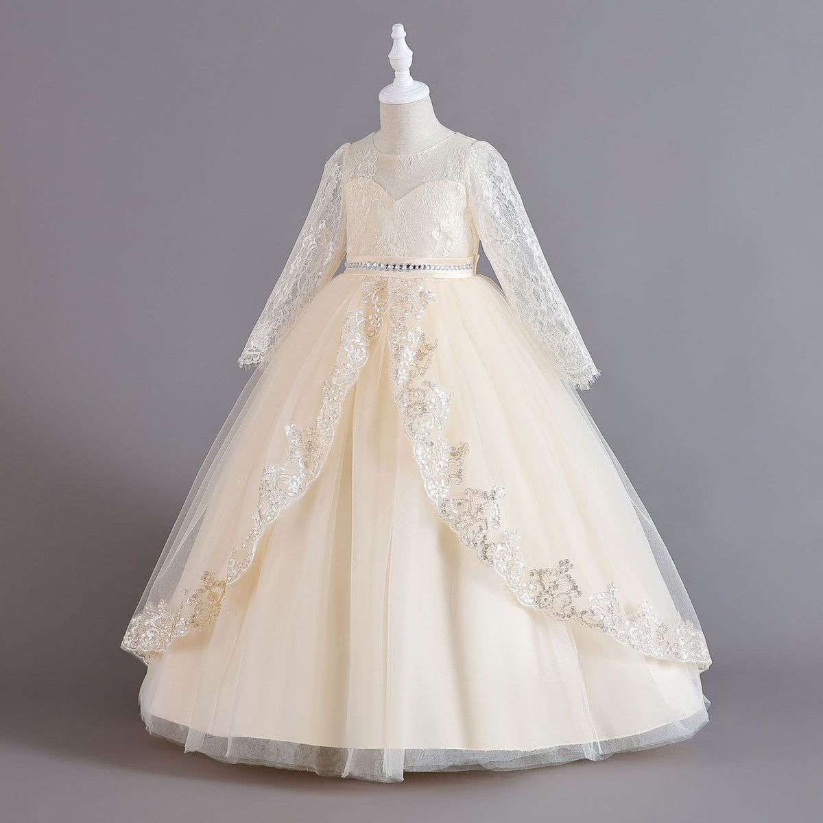 Champagne lace and tulle girls ball gown with long sheer lace sleeves, sequin lace overlay trim and rhinestone waistband, designed for weddings and Christmas, view 2