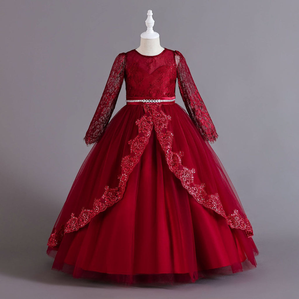 Burgundy lace and tulle girls ball gown with long sheer lace sleeves, sequin lace overlay trim and rhinestone waistband, designed for weddings and Christmas.
