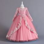 Mauve lace and tulle girls ball gown with long sheer lace sleeves, sequin lace overlay trim and rhinestone waistband, designed for weddings and Christmas.