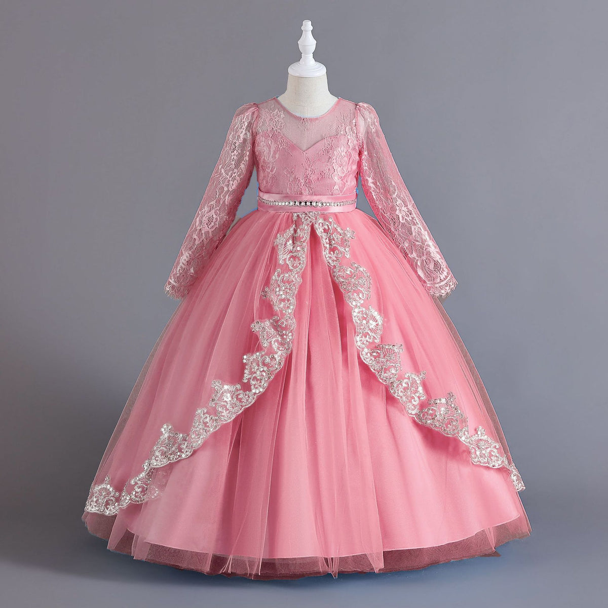 Mauve lace and tulle girls ball gown with long sheer lace sleeves, sequin lace overlay trim and rhinestone waistband, designed for weddings and Christmas.