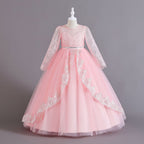 Pink lace and tulle girls ball gown with long sheer lace sleeves, sequin lace overlay trim and rhinestone waistband, designed for weddings and Christmas.