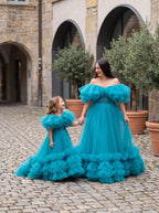 Mommy and daughter matching teal tulle ruffle gowns with train