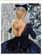 Navy sequin girls dress with long sleeves, open V-back and satin bow, designed for Christmas and holiday parties, view 6